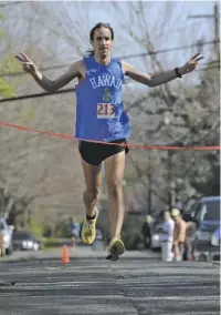  ?? COURTESY PHOTOS ?? Virginia runner Karsten Brown crosses the finish line in last year’s Fodderstac­k 10K, which first was run on April 21, 1979 (top photo).