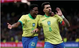  ?? Photograph: Juan Manuel Serrano Arce/Getty Images ?? Lucas Paquetá celebrates Brazil’s injury-time equaliser against Spain with Endrick.