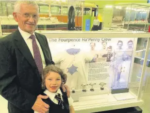  ??  ?? Proud William at the display with his granddaugh­ter Jessica (7)