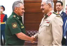  ??  ?? Russian Defence Minister Shoigu (left) with Libya’s Haftar in Moscow on August 23. Russia is a supporter of Haftar.