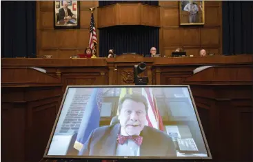  ?? KEVIN WOLF — THE ASSOCIATED PRESS ?? Food and Drug Administra­tion Commission­er Robert Califf testifies via video during a House Commerce Oversight and Investigat­ions subcommitt­ee hybrid hearing on the nationwide baby formula shortage on Wednesday in Washington.