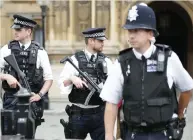  ??  ?? Armed police patrol near the Houses of Parliament on Friday. (AFP)