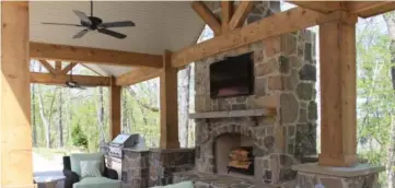  ??  ?? Top left: The pavilion is great for year-round entertaini­ng. Ceiling fans provide comfort in the warm months, while a gas-start fireplace provides warmth in the winter. Top Right: Taylor King said one of his favorite features of his home are the home’s...