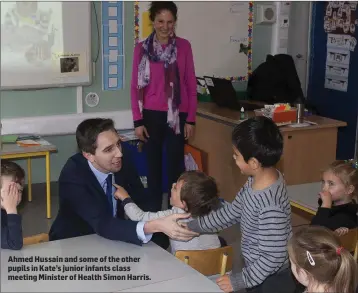  ??  ?? Ahmed Hussain and some of the other pupils in Kate’s junior infants class meeting Minister of Health Simon Harris.