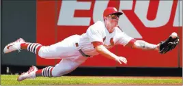  ?? Jeff Roberson ?? The Associated Press Cardinals rookie right fielder Tyler O’neill catches a ball hit by Trevor Story in the fourth inning of St. Louis’ 3-2 win over the Rockies on Thursday at Busch Stadium.