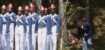  ?? —EV ESPIRITU ?? One of the newest cadets of the Philippine Military Academy Class of 2021 retrieves a cap during incorporat­ion rites on May 28.