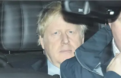  ?? Picture: AFP ?? BATTLE-WEARY. Britain’s Prime Minister and Conservati­ve leader Boris Johnson leaves the BBC studios in London yesterday. Britain will go to the polls on December 12 to vote in a general election.