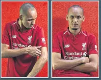  ??  ?? PERFECT FIT Fabinho puts on a Liverpool shirt for first time