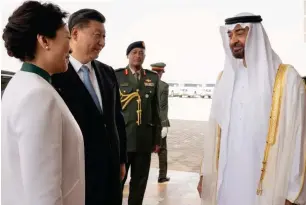  ?? Wam ?? Sheikh Mohamed bin Zayed with Xi Jinping and his wife Peng Liyuan before they left the UAE. Right, Speaker of Federal National Council Amal Qubaisi exchanges greetings with Chinese president as he concludes his three-day visit on Saturday. —
