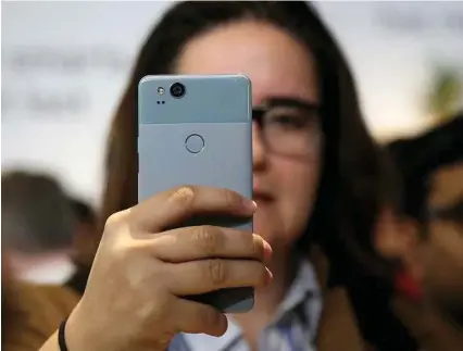  ?? Jeff Chiu / Associated Press ?? What’s most fascinatin­g about Google<0092>s new Pixel 2 phone is what’s to come. To be sure, the Pixel 2 is a solid phone, and what you’re getting is a strong tie-in to Google’s services.