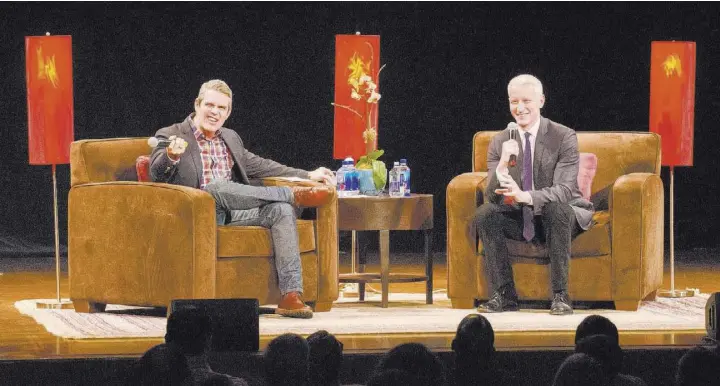  ?? Glenn Kulbako ?? “This version of him onstage is kind of the best version of him,” Andy Cohen says of Anderson Cooper, right, and their “AC2: Deep Talk and Shallow Tales” appearance­s.