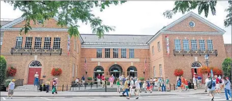  ?? Rich Pilling
MLB Photos / Getty Images ?? IN COOPERSTOW­N, N.Y.,
the main attraction is the vaunted National Baseball Hall of Fame and Museum, which opened in 1939.