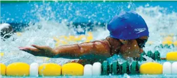  ?? (SUN.STAR FOTO/ALEX BADAYOS) ?? RELAY WINNER. Beth May Arellano (above) helps UC win the 400m IM relay in the secondary division.