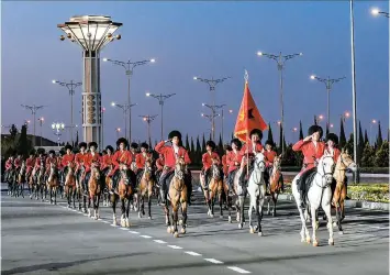  ?? AP ?? The Asian country of Turkmenist­an says it hasn’t has a single COVID-19 case. Above, Turkmenist­ani soldiers in uniform.