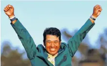  ?? REUTERS ?? Japan’s Hideki Matsuyama celebrates with his green jacket after winning The Masters in Augusta, Ga. on Sunday.