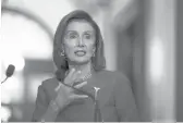  ?? J. SCOTT APPLEWHITE/AP ?? With the fate of a $3.5 trillion infrastruc­ture package unclear, House Speaker Nancy Pelosi promised centrists a vote on a smaller $1 trillion package.