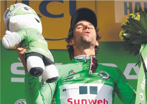  ?? Picture: GETTY IMAGES ?? An emotional Michael Matthews celebrates on the podium after taking the green points jersey.