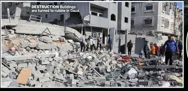  ?? ?? DESTRUCTIO­N Buildings are turned to rubble in Gaza