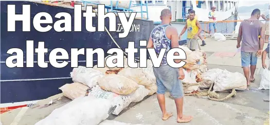  ?? Picture: SUPPLIED ?? Tavioka being off-loaded at Suva wharf from Gau, where Josaia Rayawa’s farm is located.