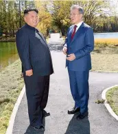  ??  ?? South Korean President Moon Jae- in, right, talks with North Korean leader Kim Jong Un at the Samjiyon guesthouse in North Korea on Thursday.