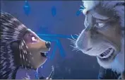  ?? ?? SCARLETT JOHANSSON voices Ash, left, and Bono voices lion Clay Calloway in “Sing 2.”