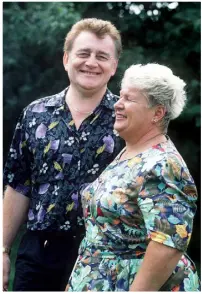  ??  ?? POPULAR AND HUMBLE: Broadcasti­ng legend Larry Gogan. Photo: Mark Condren. Gogan, above, with his wife Florrie, who died in 2002. Below: DJs pose with cars in a shot taken for the ‘RTE Guide’ circa 1982. Jimmy Greeley is standing at the back. From left to right in the front are: Larry Gogan, Marty Whelan, Gerry Ryan, Lorcan Murray and Jim O’Neill