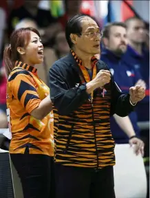  ??  ?? All pumped up: Holloway cheah (right) and siti safiyah amirah abdul rahman at the sea Games last month. He is not sure if his contract will be renewed.