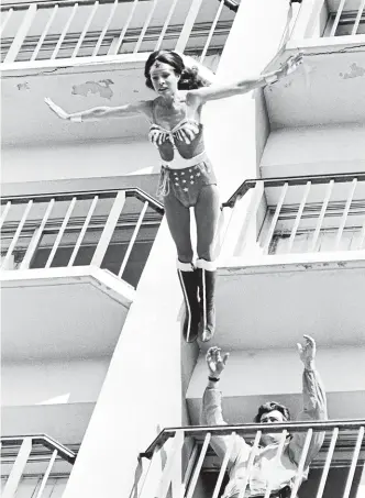  ?? GETTY ?? Kitty O’Neil as Wonder Woman, jumping from a building in Los Angeles. In one stunt for the TV show, she fell a record 38 metres on to an inflated airbag below. ‘‘If I hadn’t hit the centre of the bag, I probably would have been killed,’’ she said.
