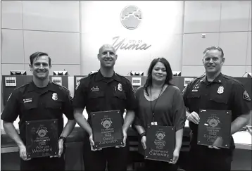  ?? LOANED PHOTO/YUMA FIRE DEPARTMENT ?? THE YUMA FIRE DEPARTMENT HELD AN EVENING CEREMONY on Tuesday at Fire Station No. 1 to mark the beginning of Fire Prevention Week, during which Aaron Wonders was named as Firefighte­r of the Year, David Zanovitch the Engineer of the Year, Stephanie...