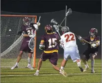  ?? PETE BANNAN — MEDIANEWS GROUP FILE ?? West Chester East’s Joe Carrozza fires a goal past Avon Grove goalie Zac Hanway in a key 2019 game.