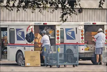  ?? Al Seib Los Angeles Times ?? THE TIMES mailed 100 letters and tracked their progress. A spokeswoma­n says the Postal Service continues to “identify and address some ongoing service issues in certain areas.” Above, mail carriers in Van Nuys.