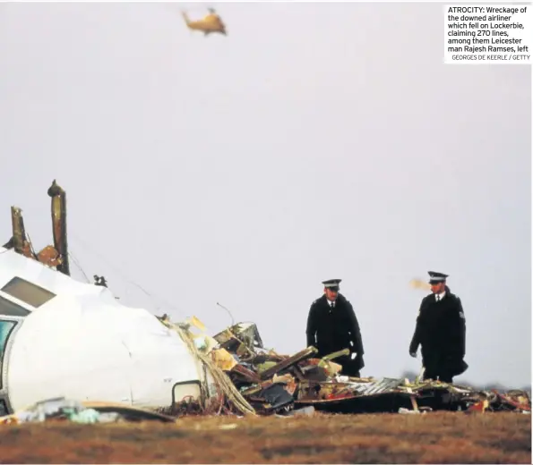  ?? GEORGES DE KEERLE / GETTY ?? ATROCITY: Wreckage of the downed airliner which fell on Lockerbie, claiming 270 lines, among them Leicester man Rajesh Ramses, left