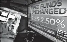  ?? Richard Drew / Associated Press ?? The message the Fed is poised to send Wednesday will seek to avoid escalating concerns about the health of the economy.