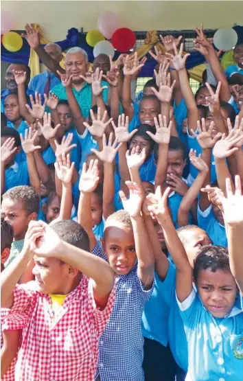  ?? Photo: Peni Komaisavai ?? Prime Minister Voreqe Bainimaram­a with Year One students of Naseyani Primary School on June 12, 2018.