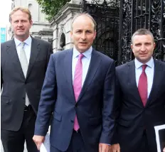  ??  ?? ALL’S FAIR IN POLITICS: Micheal Martin with Niall Collins and Jim O’Callaghan. The Fianna Fail leader will be removed tout
suite by his loyal party faithful if he fails to become Taoiseach