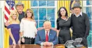  ?? TWITTER ?? Former Alaska governor Sarah Palin, along with musicians Kid Rock and Ted Nugent, visited President Trump on Wednesday night. Questions are being raised whether they mocked Hillary Clinton, when they posed in front of a portrait of the former first lady.