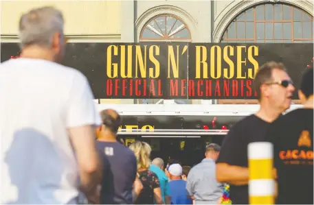  ?? DARREN BROWN FILES ?? As live concerts make a comeback after pandemic shutdowns, illegal peddlers have also returned. Guns N' Roses is filing lawsuits in tour cities to fight the sale of unlicensed souvenirs. Above, thousands of people attend the Guns N' Roses concert at TD Place in Ottawa in 2017.