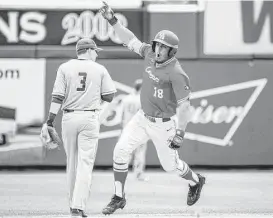  ?? University of Houston Athletics ?? Grayson Padgett rounds the bases after his eighth-inning pinch-hit home run put Houston ahead of Memphis in the Cougars’ opening round victory.