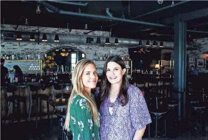  ??  ?? Libby Wunderlich, owner of Bar Ware, right, and Bibi Janus, co-owner of Juicebroth­ers, are opening their businesses next to each other at 276 S. Front St. PHOTOS BY BRAD VEST/THE COMMERCIAL APPEAL