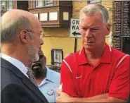  ?? SUBMITTED PHOTO ?? State Sen. Tom McGarrigle, R-26 of Springfiel­d, chats with Gov. Tom Wolf during tour of flood-ravaged neighborho­ods in Upper Darby.