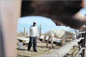  ??  ?? Elliot Mohludi, treasurer of Sedibeng Initiation Traditiona­l Surgeon Committee, is part of a group of men who assist the police in visiting and closing down illegal initiation schools in Sebokeng.