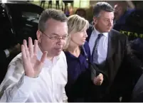  ?? (Umit Bektas/Reuters) ?? US PASTOR Andrew Brunson and his wife, Norrine, arrive on Friday at the airport in Izmir, Turkey.