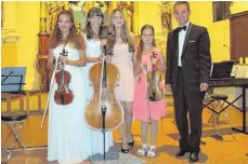  ?? FOTO: PR ?? Familie Aleksejtsc­hik bei ihrem Konzert in der Stephanusk­irche.