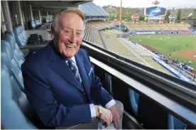  ?? Photograph: Mark J Terrill/AP ?? Vin Scully, who died on Tuesday at the age of 94, was the Dodgers broadcaste­r for 67 seasons before retiring in 2016.