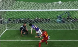  ?? Cacace/AFP/Getty Images ?? Ao Tanaka (17) scores Japan's second goal to leave Spain floored. Photograph: Giuseppe