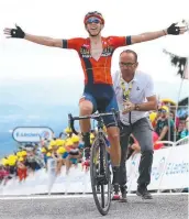  ??  ?? JUBILANT: Stage winner Dylan Teuns of Belgium and Team Bahrain-Merida. Picture: GETTY IMAGES