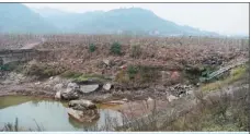  ?? TANG YI / XINHUA ?? A site in Shizhu county, Chongqing, under ecological restoratio­n in January.