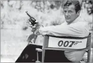  ?? AP PHOTO, FILE ?? British actor Roger Moore, playing the title role of secret service agent 007, James Bond, is shown on location in England in 1972.