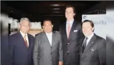  ??  ?? Justice Department officials told the Miami Herald they are building a case against bankers Luis Oberto Anselmi, second from right, and his brother, Ignacio, far right.