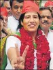  ?? HT ?? Samajwadi Party candidate Meera Vardhan, 54, is wife of socialist leader Acharya Narendra Dev’s grandson, Yasho Vardhan.